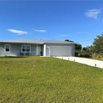Rent this 3 bed house on 9003 Largo Circle in Port La Belle, Hendry County