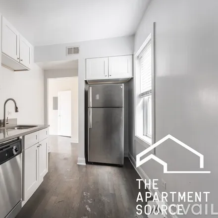 Rent this 2 bed apartment on 3535 W Fullerton Ave