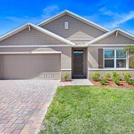 Rent this 4 bed house on Dugan Circle Southeast in Palm Bay, FL