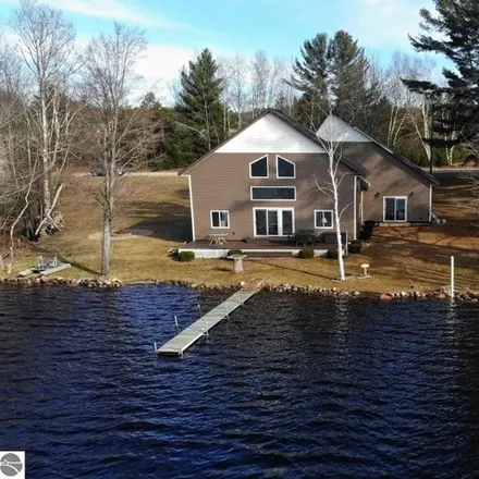 Buy this 3 bed house on Lake Drive Northeast in Excelsior Township, MI 49646