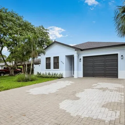 Buy this 4 bed house on 6755 2nd St in Jupiter, Florida