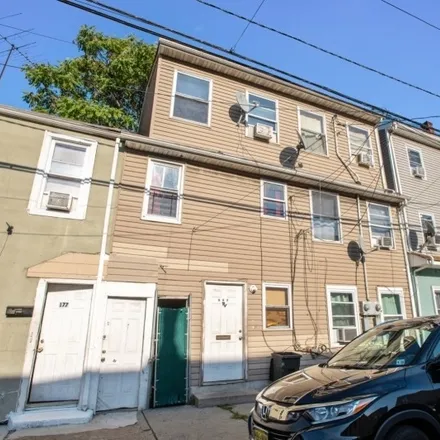 Buy this 5 bed townhouse on 21st Avenue in Paterson, NJ 07501