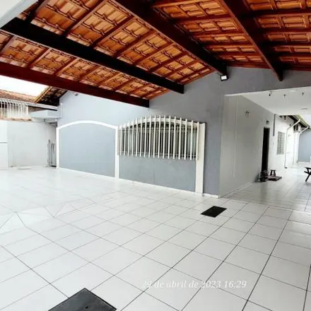 Buy this 3 bed house on Rua das Begônias in Flórida, Praia Grande - SP