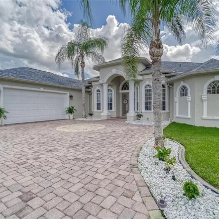 Buy this 4 bed house on 13464 Satinwood Court in Spring Hill, FL 34609