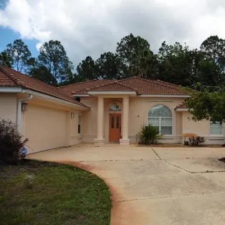 Buy this 3 bed house on 87 Rose Drive in Palm Coast, FL 32164
