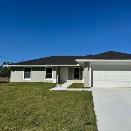 Buy this 3 bed house on 1207 Ermine Street in Lehigh Acres, FL 33974