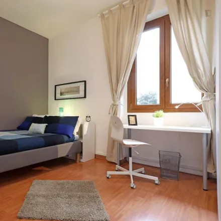 Rent this 6 bed room on Via dei Giornalisti in 55, 00100 Rome RM