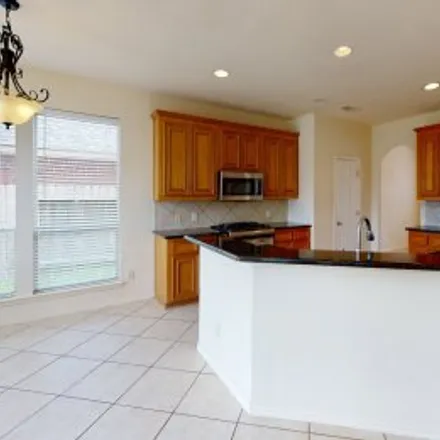 Rent this 4 bed apartment on 6014 Meadowstream Court in Grand Lakes, Katy