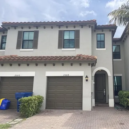 Buy this 3 bed townhouse on Oysterwood Lane in Riviera Beach, FL 33403