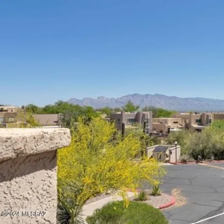 Buy this 2 bed condo on 26 North Players Club Drive in Tucson, AZ 85745