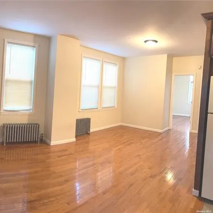 Rent this 3 bed house on 78-34 69th Avenue in New York, NY 11379