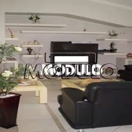 Buy this 4 bed house on Rua das Juritis in Cidade Jardim, Uberlândia - MG