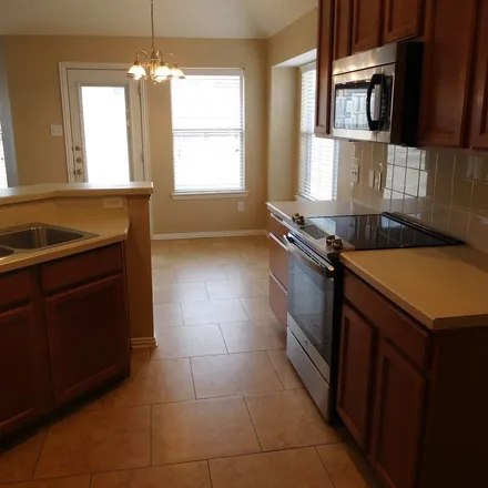 Rent this 3 bed apartment on 484 Mustang Trail in Celina, TX 75009