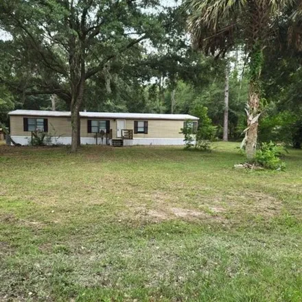 Buy this studio apartment on 21848 Southeast 64 Lane in Levy County, FL 32668