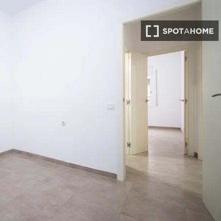 Rent this 2 bed room on Carrer d'Alella in 41B, 08016 Barcelona