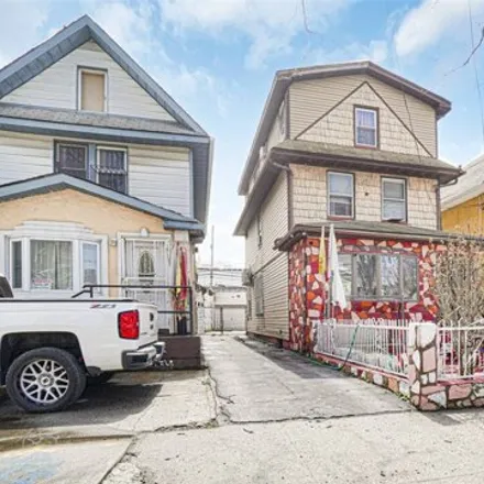 Buy this 3 bed house on 181-16 93rd Avenue in New York, NY 11433