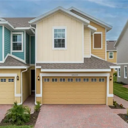 Rent this 3 bed house on 34200 Cinder Way in Wesley Chapel, Florida