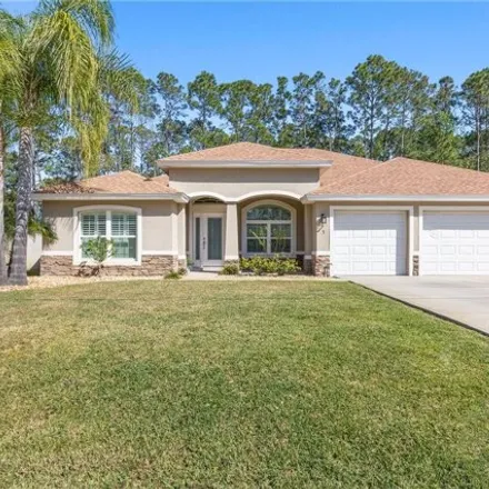Buy this 3 bed house on 3 Edith Pope Drive in Palm Coast, FL 32164