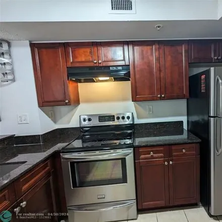 Rent this 2 bed condo on Lyons Road in Coconut Creek, FL 33073