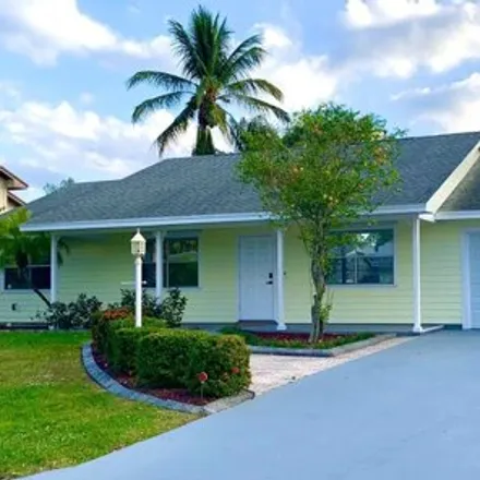 Rent this 3 bed house on 602 Northeast Maranta Terrado in Jensen Beach, FL 34957