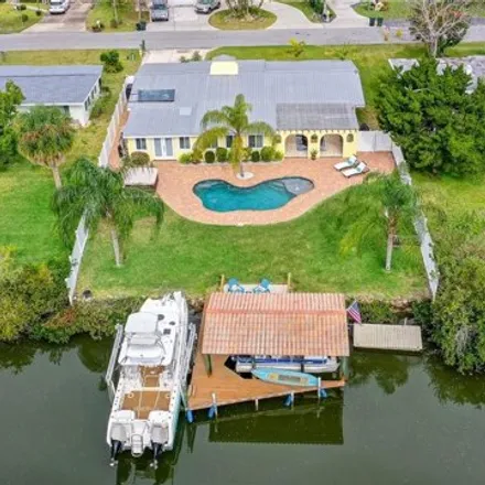 Buy this 4 bed house on 51 Richmond Dr in New Smyrna Beach, Florida