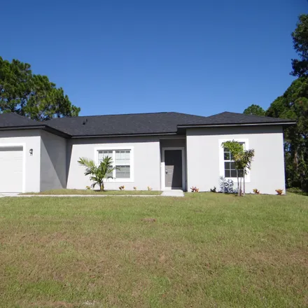 Buy this 3 bed house on 593 Wildwood Avenue Southwest in Palm Bay, FL 32908