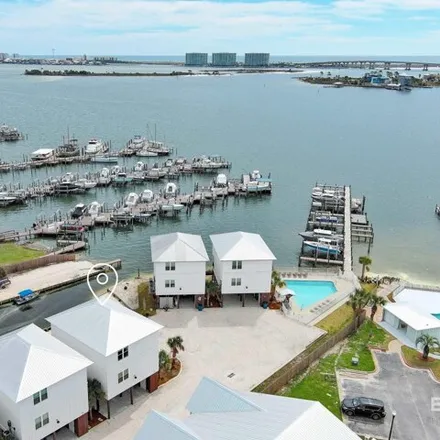 Buy this 3 bed house on WAHOO WATERSPORTS in 4576 G C Bill Lane, Orange Beach