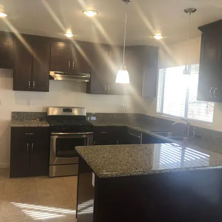 Rent this 3 bed apartment on 2069 Candice Avenue in Rosamond, CA 93560