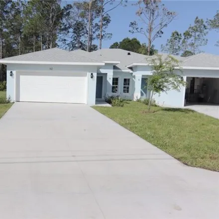 Rent this 3 bed house on 64 Slumber Meadow Trail in Palm Coast, FL 32164