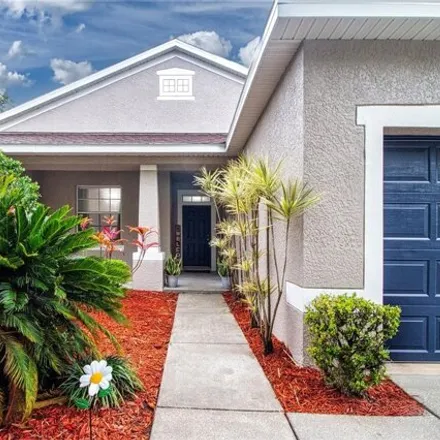 Buy this 4 bed house on 11045 Holly Cone Drive in Riverview, FL 33579