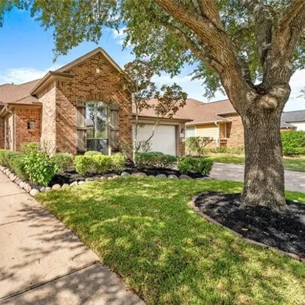 Rent this 4 bed house on 23131 Tranquil Spring Lane in Seven Meadows, TX 77494