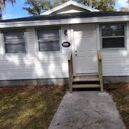 Rent this 4 bed house on 1765 John Street in Yulee, FL 32097