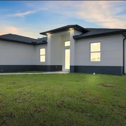 Buy this 3 bed house on 3699 Sunset Road in Lehigh Acres, FL 33971