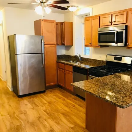 Rent this 3 bed apartment on 2937 N Allen Ave