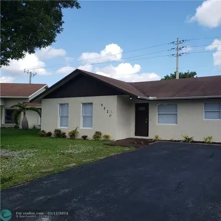 Rent this 3 bed house on 4531 Northwest 94th Avenue in Sunrise, FL 33351