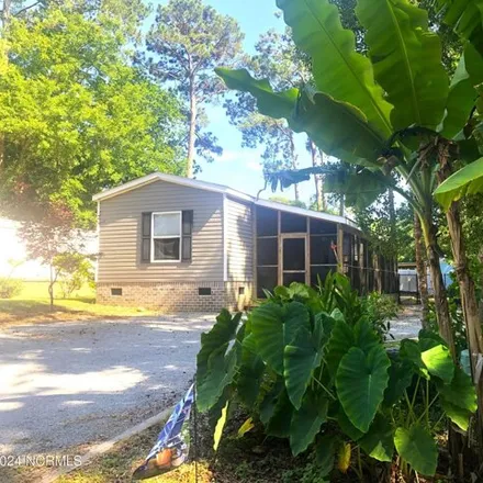 Buy this studio apartment on 9167 East Calabash Drive Southwest in Shady Forest, Brunswick County