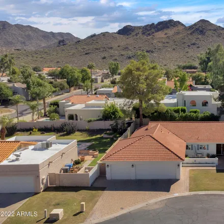Buy this 4 bed house on 3411 East Calaveros Drive in Phoenix, AZ 85028