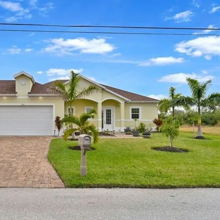 Buy this 3 bed house on 686 Southwest 31st Terrace in Cape Coral, FL 33914