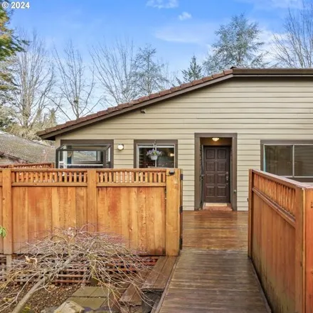 Buy this 3 bed house on 7558 Southwest Cresmoor Drive in Beaverton, OR 97008