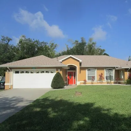 Rent this 4 bed house on 1088 Briarwood Boulevard Northeast in Palm Bay, FL 32905