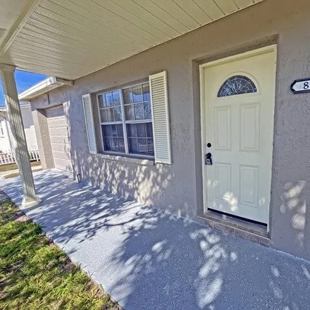 Rent this 2 bed house on 8423 Newton Drive in Jasmine Estates, FL 34668