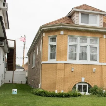 Rent this 2 bed house on 6310 West Warwick Avenue in Chicago, IL 60634