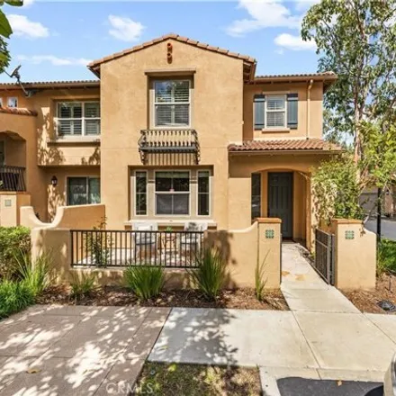 Rent this 3 bed condo on 60-66 Hedge Bloom in Irvine, CA 92618