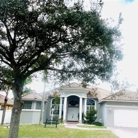Rent this 4 bed house on 13908 Northwest 22nd Court in Pembroke Pines, FL 33028