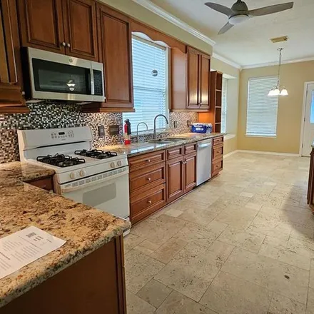 Rent this 4 bed apartment on 3121 English Oaks Boulevard in Pearland, TX 77584
