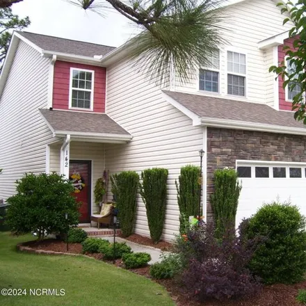 Rent this 4 bed house on 142 Lightwater Drive in Aberdeen, Moore County