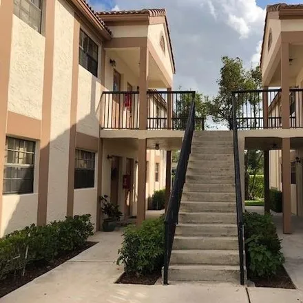 Rent this 2 bed condo on 12278 Royal Palm Boulevard