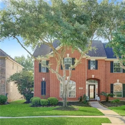 Buy this 4 bed house on 2047 Upland Park Drive in Sugar Land, TX 77479