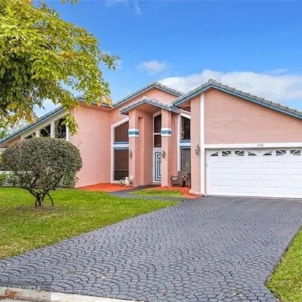 Buy this 5 bed house on 5150 Northwest 85th Road in Pine Ridge, Coral Springs