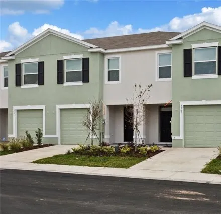 Rent this 3 bed townhouse on 3707 Copper Beech Dr in Land O Lakes, Florida